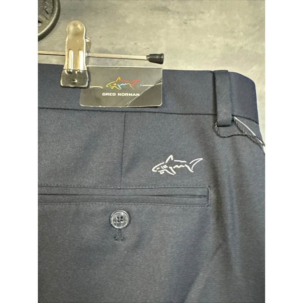NWT Greg Norman navy blue performance golf shorts Flat Front Smooth Fabric S36